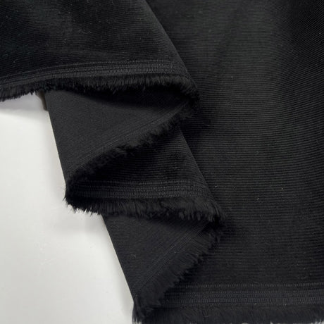 Stretch 21 Wale Needlecord Black Cotton Elastane Woven Trouser Fabric Fold