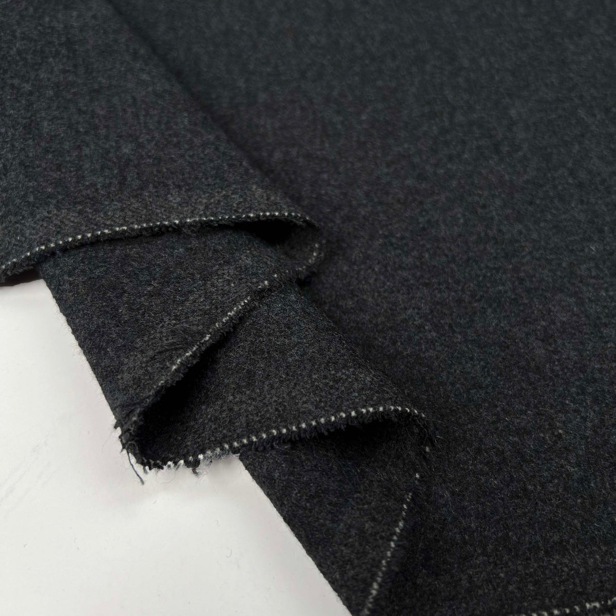 Wool & Polyester Mix Grey Marl Suiting Fabric Survival Instincts Fold