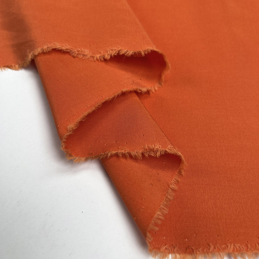 Tangerine Silk Cotton Blend Plain Woven Orange Dress Fabric Fold