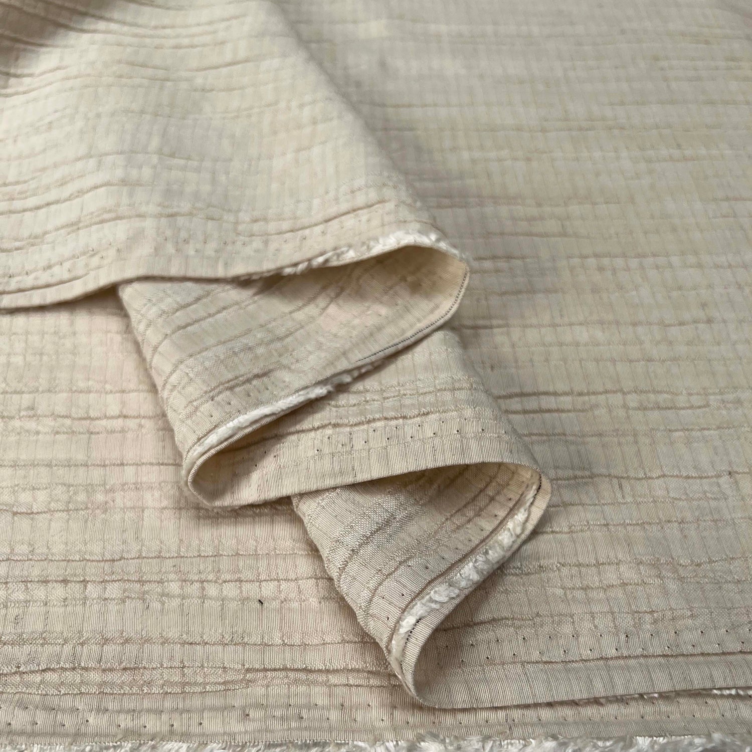 Viscose_Linen_Crinkle_Champagne_Polyester_Spandex_Cream_160gsm_Dress_Fabric_Fold