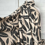 Beige Black Leaf Print Dress Fabric | Viscose Marocain Spot The Sand Mannequin