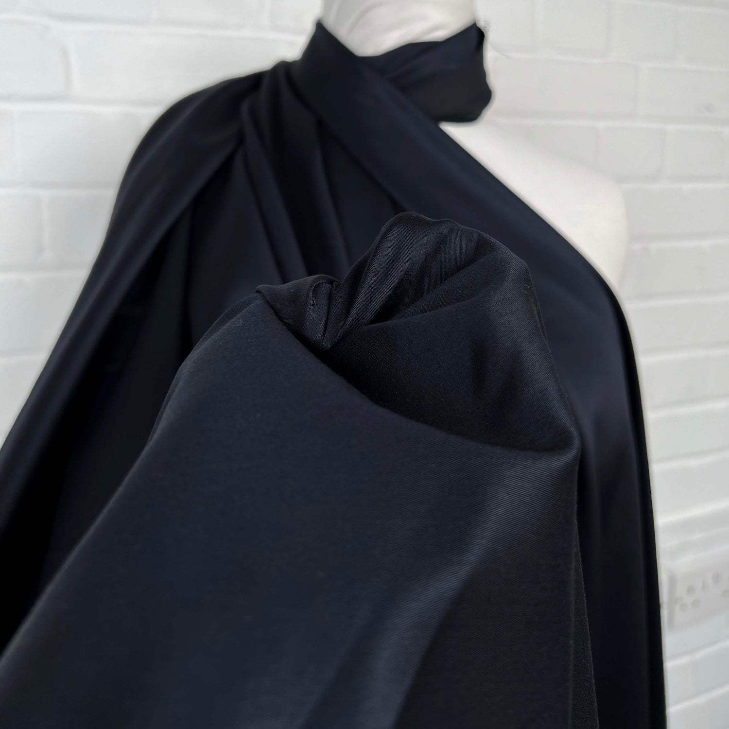 What Shines Yonder Polyester Navy Black Satin Heavy Dress Fabric Close Up