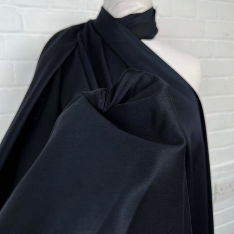 What Shines Yonder Polyester Navy Black Satin Heavy Dress Fabric Close Up