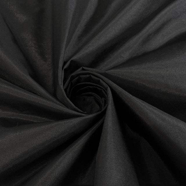 A Conglomeration Black Self Lined Duck Down Polyamid Silk Polyester Pu Coated Fabric Twist