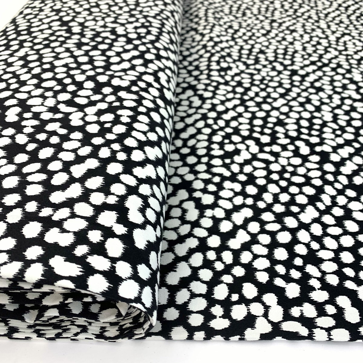 An Elegant Take Laurent Spotty Black White John Louden Stretch Woven Dress Fabric Roll 3Eb31760 51Aa 411F 95C9 Bb16B9669Ef0