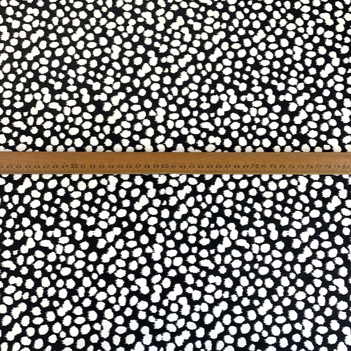 An Elegant Take Laurent Spotty Black White John Louden Stretch Woven Dress Fabric Scale 67F7Ee8D Dafe 43A2 8Ae0 4Ee73F383Bb0