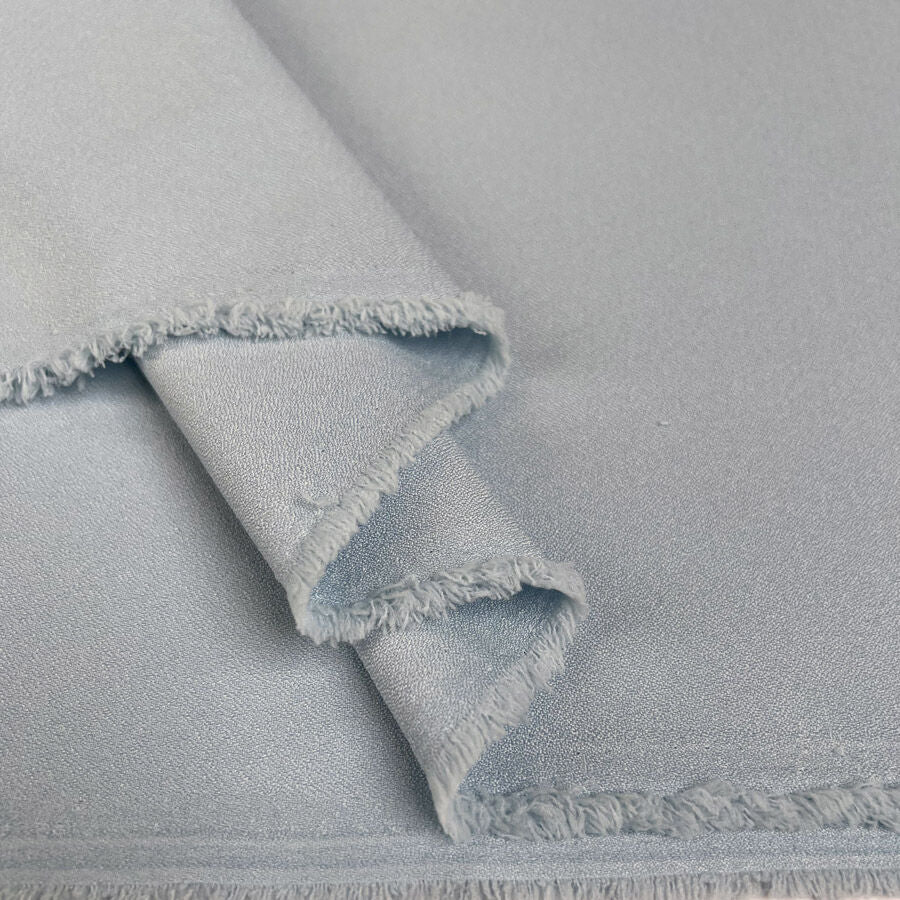 Azure Mist Blue Polyester Elastane Marocain Stretch Crepe Dress Fabric Fold