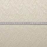 Boduoir Cream Swirly Embossed Polyester Dress Craft Fabric