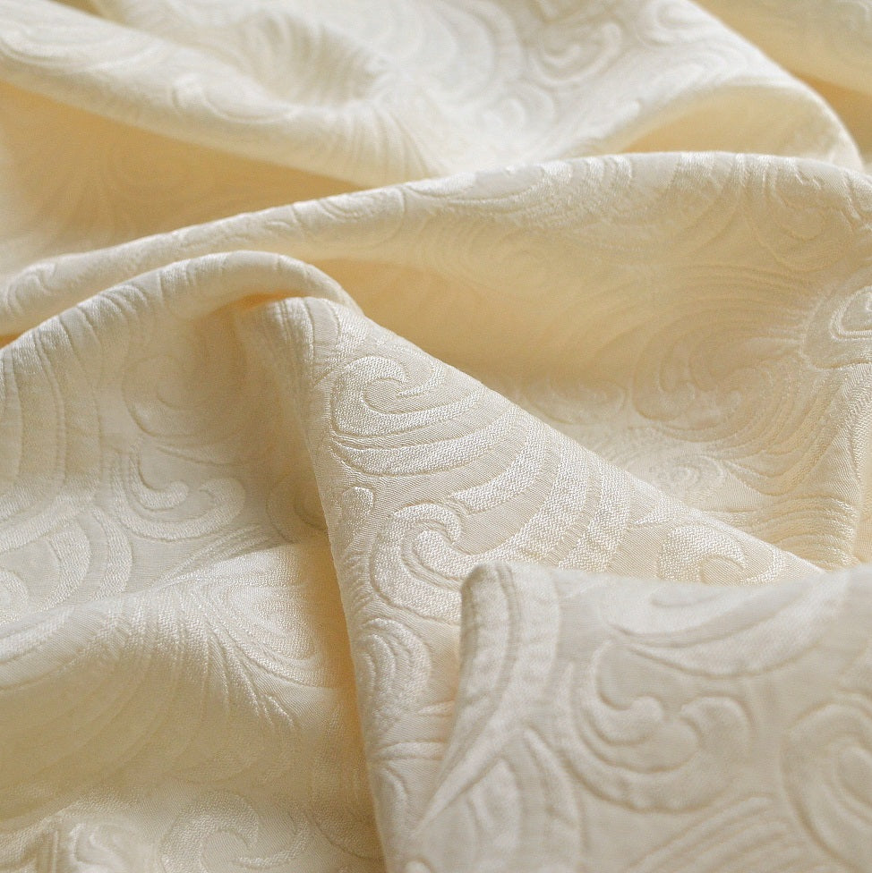 Boduoir Cream Swirly Embossed Polyetser Dress Craft Fabric D