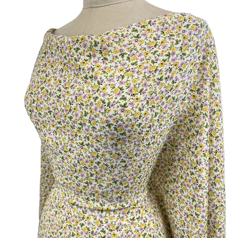 Buttercup Bliss Yellow White Floral Viscose Dressmaking Fabric Side