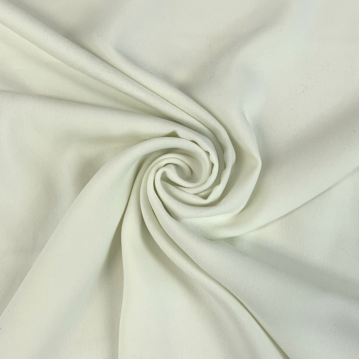 Candy Crepe Pale Ice Green Polyester Dress Fabric Swirl