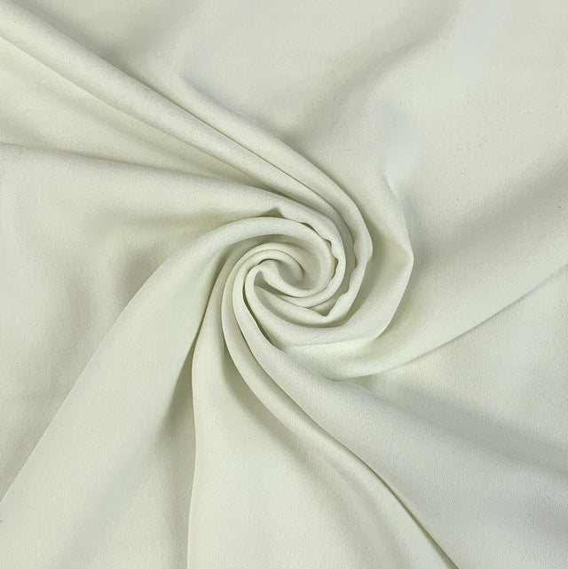 Candy Crepe Pale Ice Green Polyester Dress Fabric Swirl