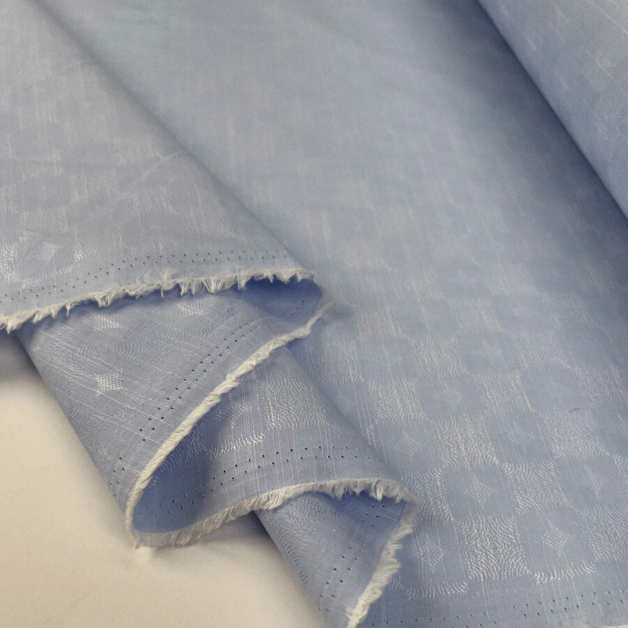 Cool Runnings Blue Cotton Floral Abstract Fine Woven Shirting Fabric Fold