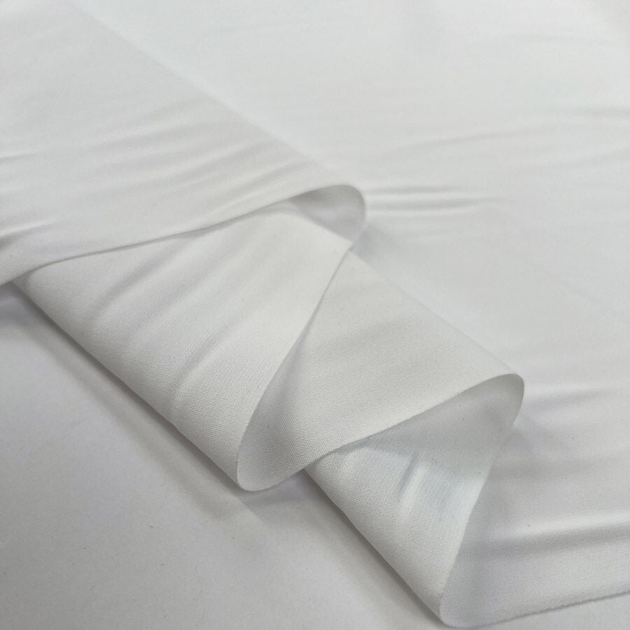 Core Range Polyester Peach Finish White Lightweight Dress Fabric Fold