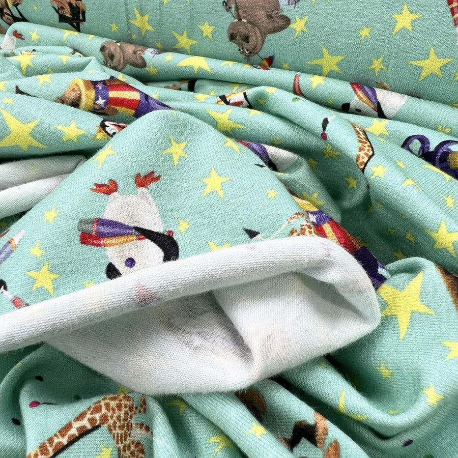 Cotton Elastane Jersey Fabric Licensed Madagascar Aqua Circus Print
