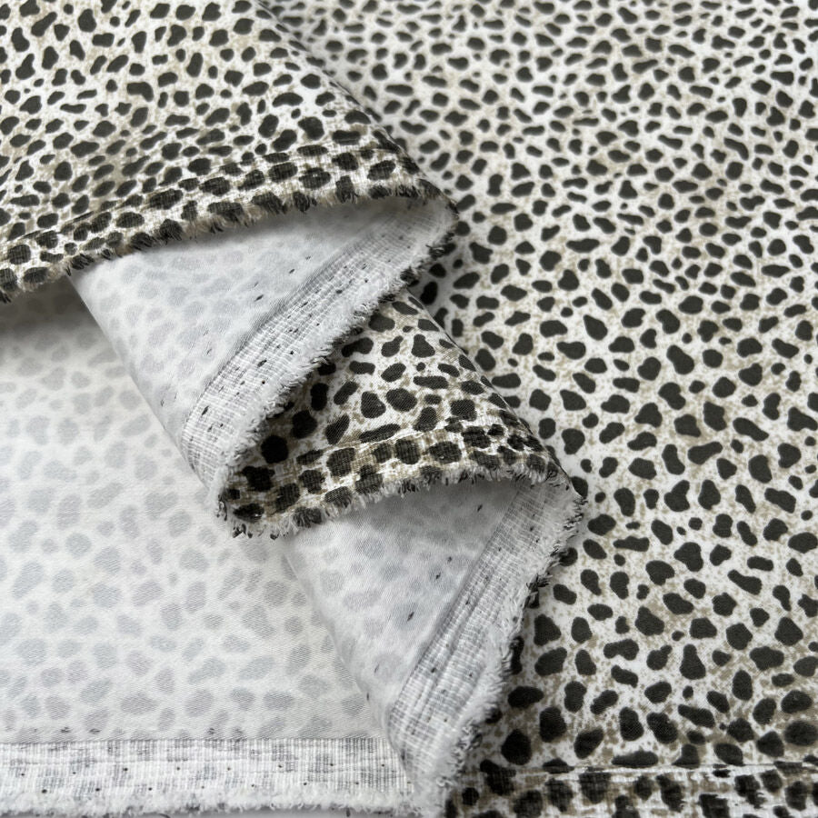 Cotton Stretch Olive Cheetah White Animal Print Polyester Elastane Woven Trouser Fabric Fold