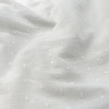 Dainty Dot Ivory Cotton Dobby Woven Fabric