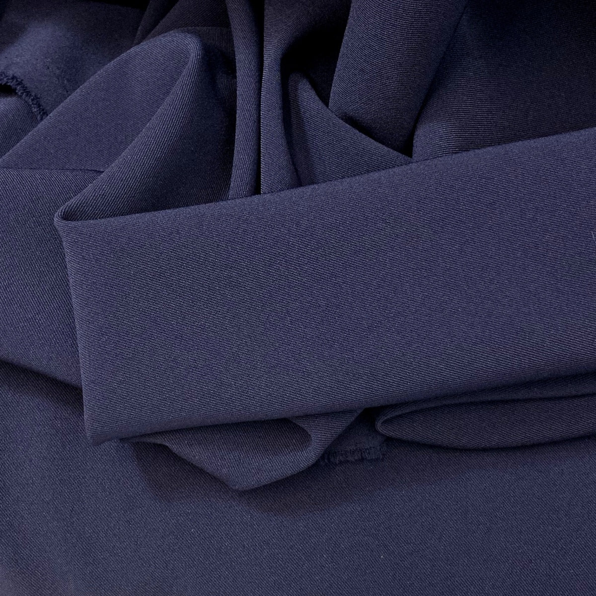 Dynasty Navy Two Way Stretch Drapey Polyester Spandex Suiting Fabric Fold
