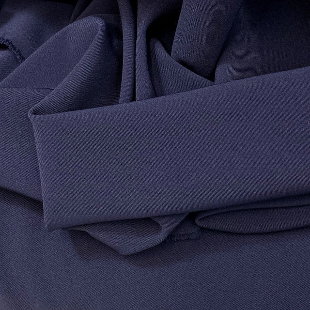 Dynasty Navy Two Way Stretch Drapey Polyester Spandex Suiting Fabric Fold