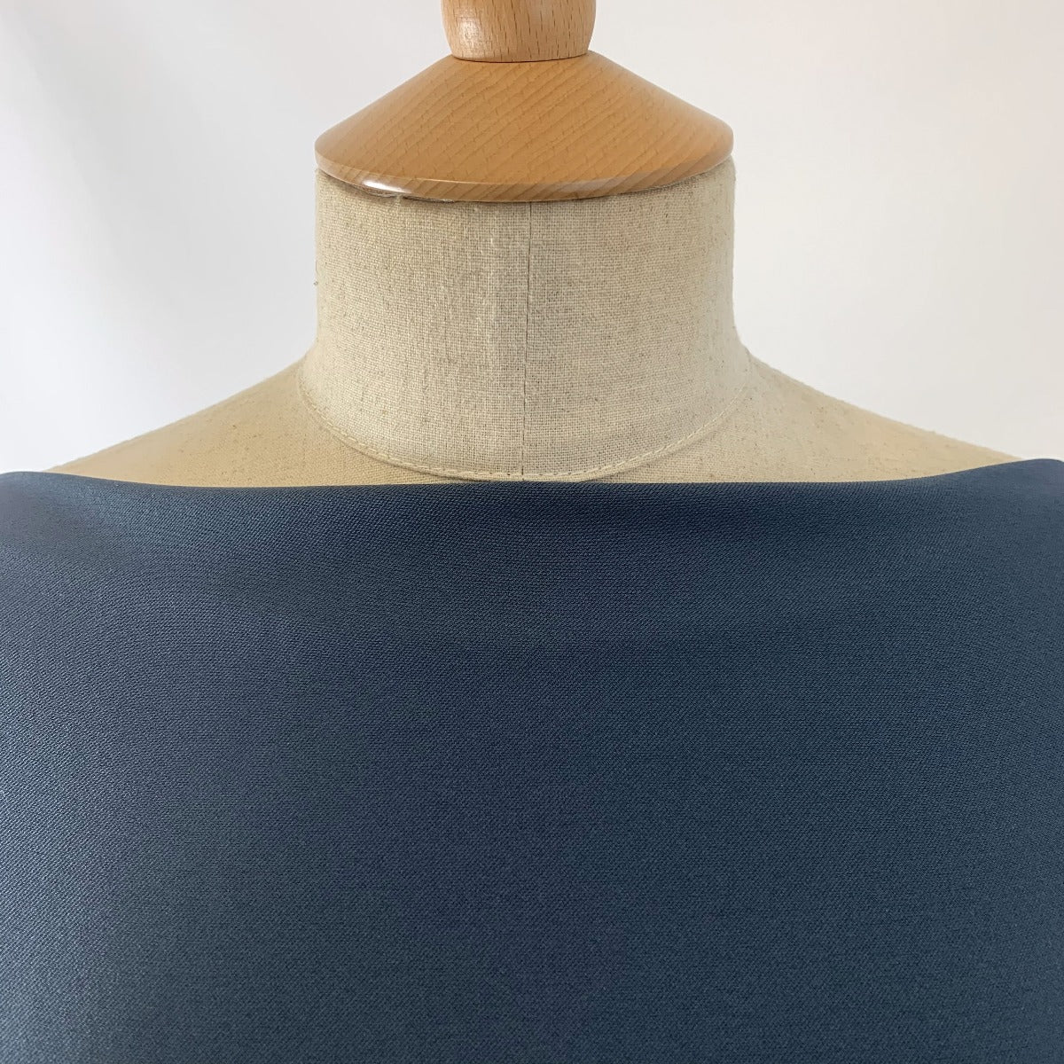 Dynasty Teal Two Way Stretch Drapey Polyester Spandex Suiting Fabric Neck