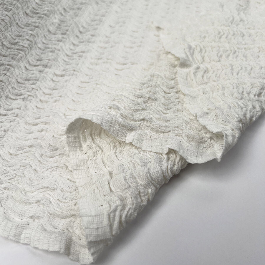 Ebb Tide Jersey Cream Jacquard Polyester Nylon Stretch Textured Wrinkle Finish Fabric Fold