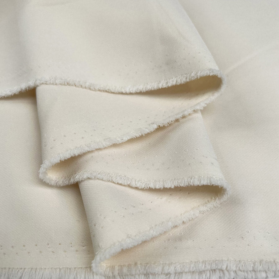 Elona ecru polyester spandex two way stretch suiting fabric fold