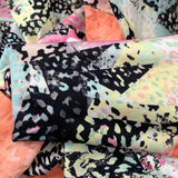 Festive Madness Polyester Multicoloured Bright Neon Jersey Dress Fabric Close Up Fabric Photo Fb4E3759 D1A0 49A8 8D16 6F3B857C4D60