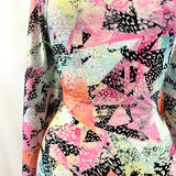 Festive Madness Polyester Multicoloured Bright Neon Jersey Dress Fabric Manequin Close Up Fabric Photo
