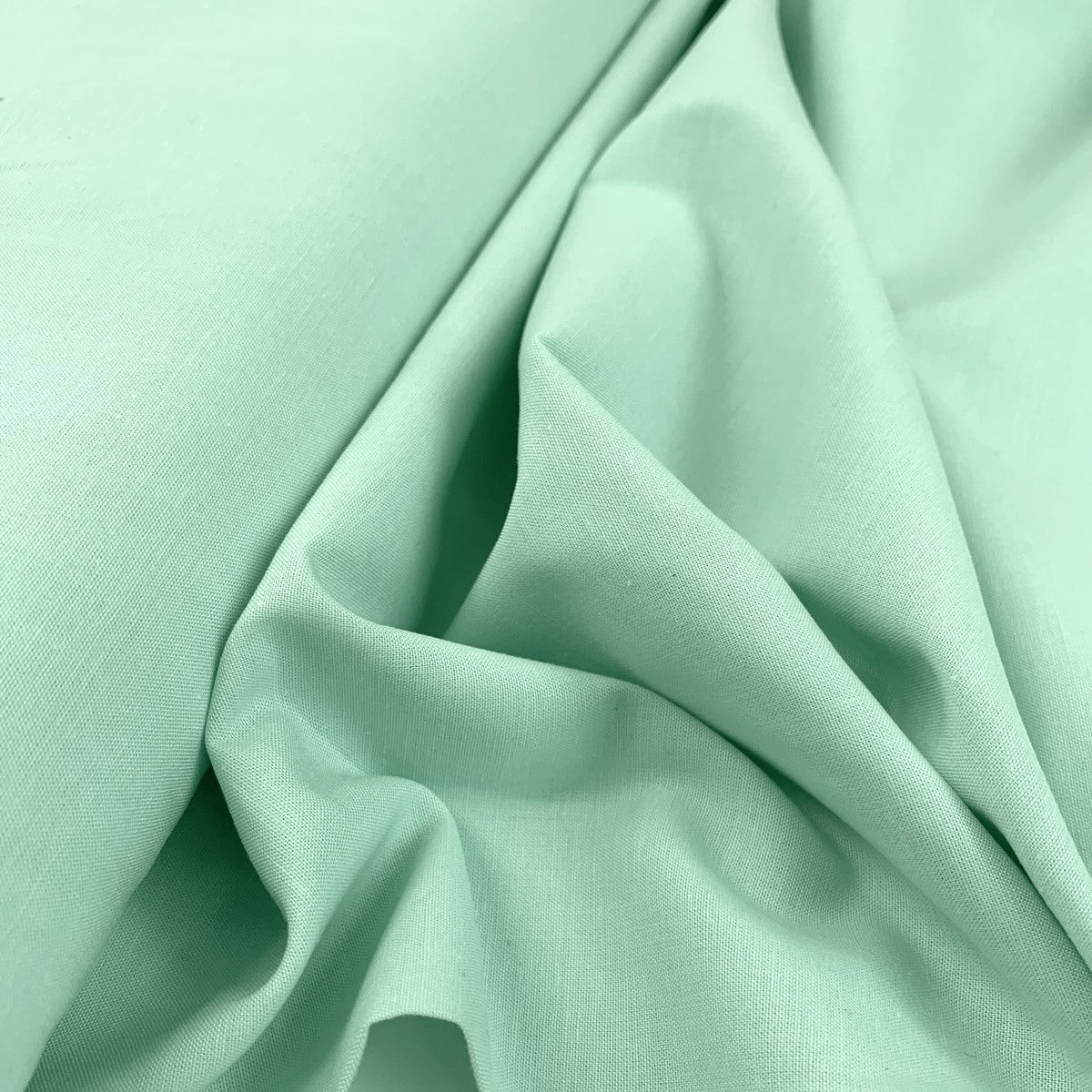 Finest Chambray Mint Lightweight Cotton Fabric Fold 2