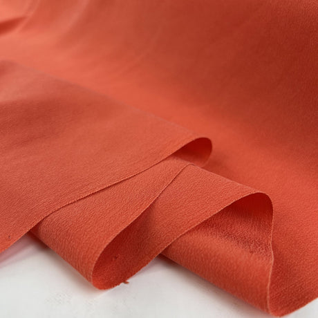 Finest Silk Coral Orange Plain Italian Deadstock Lightweight Dress Fabric Fold E08F891E E711 4094 Ac50 194E0811F5Ae