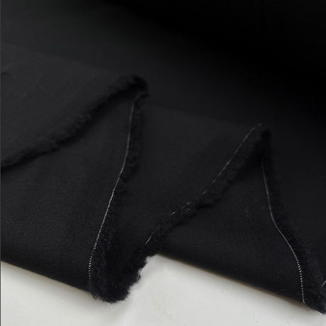 Fleece wool suiting black elastane stretch woven italian deadstock fabric fold