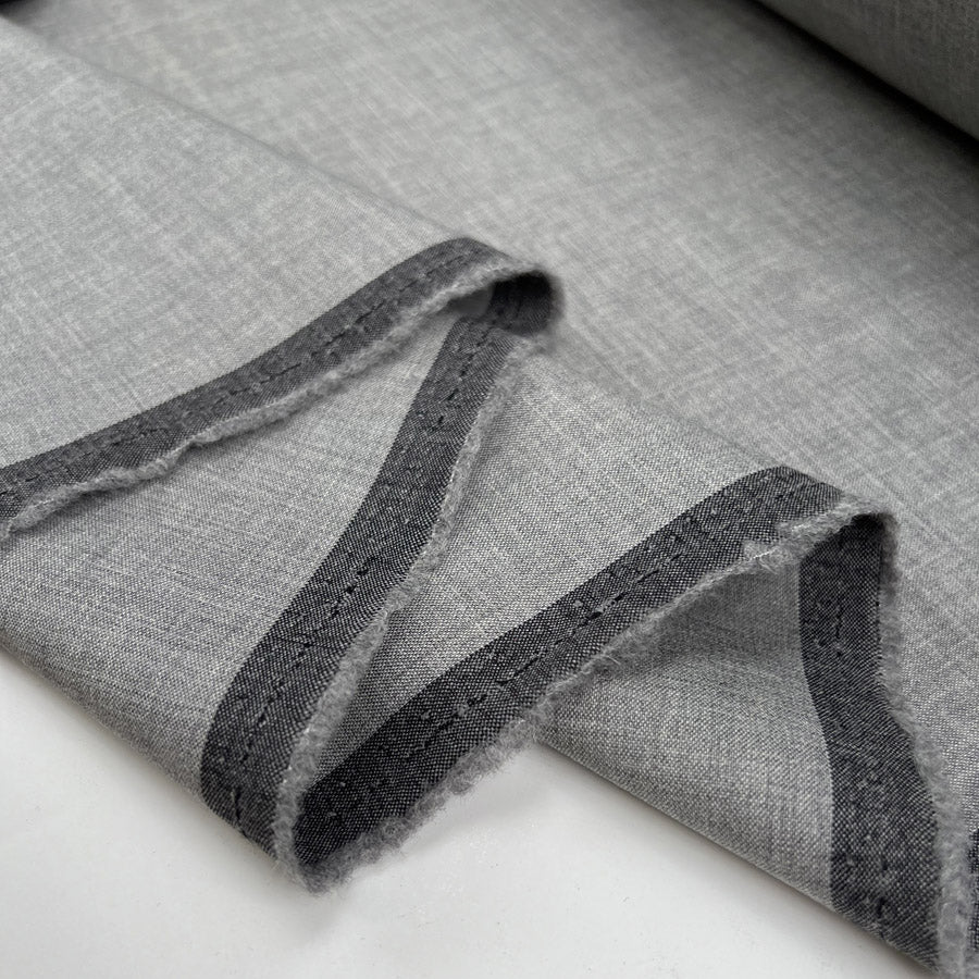 Fleece wool suiting mid grey elastane stretch woven italian deadstock fabric fold