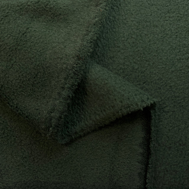 Forest Fuzz Dark Green Polyester Fleece Fabric Fold