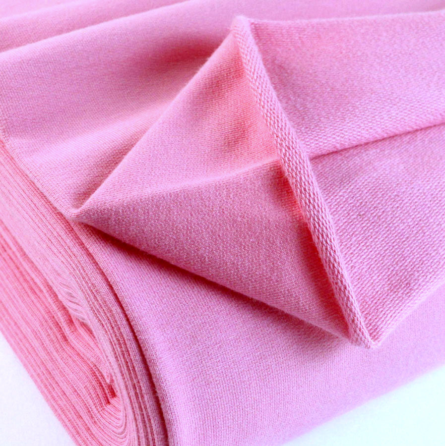 French Terry Baby Pink Jersey Fabric With A Looped Back Scale Fabric Close Up Photo