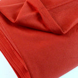 French Terry Red Jersey Fabric With A Looped Back Scale Fabric Close Up Photo