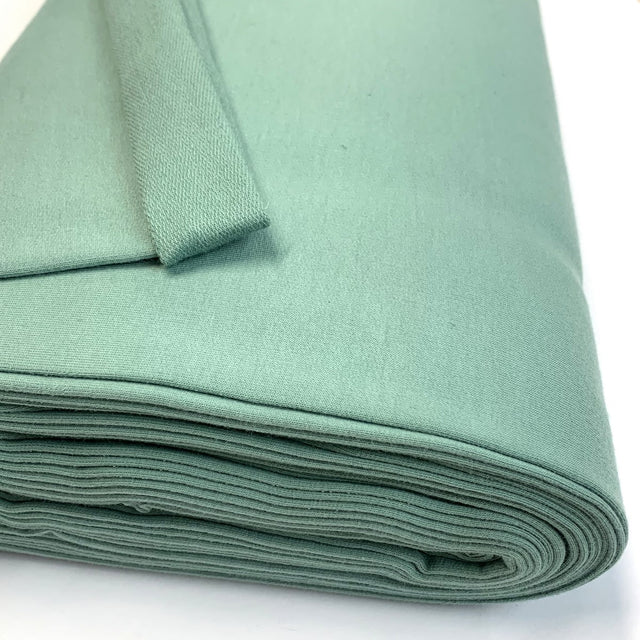 French Terry Sea Green Plain Dusky Mint Coloured French Terry Sweatshirt Knitted Jersey Fabric Close Up Drape Fabric Photo Custom