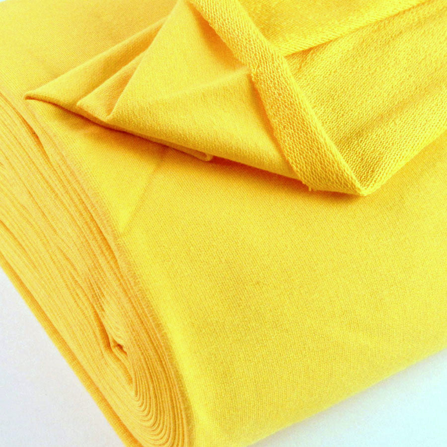 French Terry Yellow Jersey Fabric With A Looped Back Scale Fabric Close Up Photo