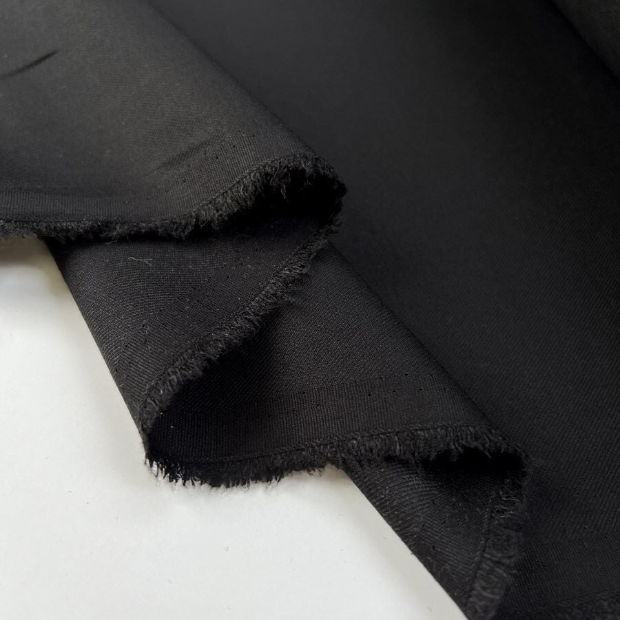 Fuss And Bother Black Polyester Viscose Wool Elastane Suiting Fabric Fold