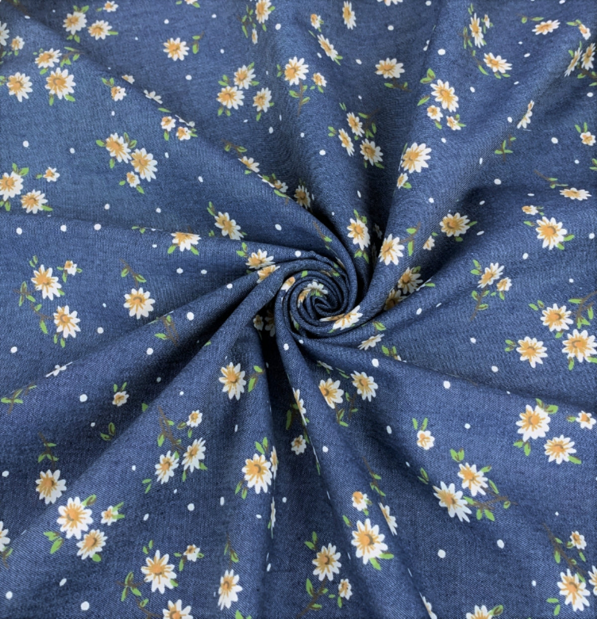 Heavenly evening daisy lightweight multicoloured cotton printed denim chambray shirting fabric close up drape fabric photo