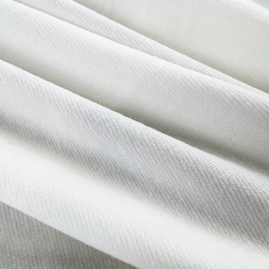 Interlock A Ivory Soft White Cotton Jersey Dress Fabric Cu 1A294F6C B18C 4925 A9D0 Ff100C27D47A