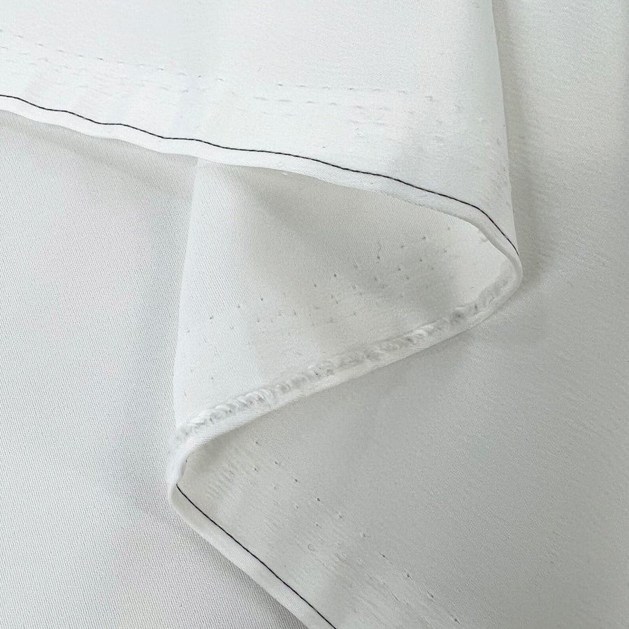 Ivory Sands Textured Sateen Polyester Spandex Dress Fabric Fold