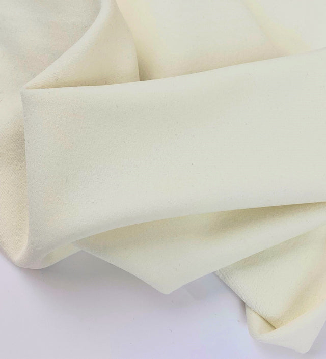 Jk Scuba Crepe Ivory Polyester Scuba Knitted Stretch Crepe Fabric Close Up Drape Fabric Photo