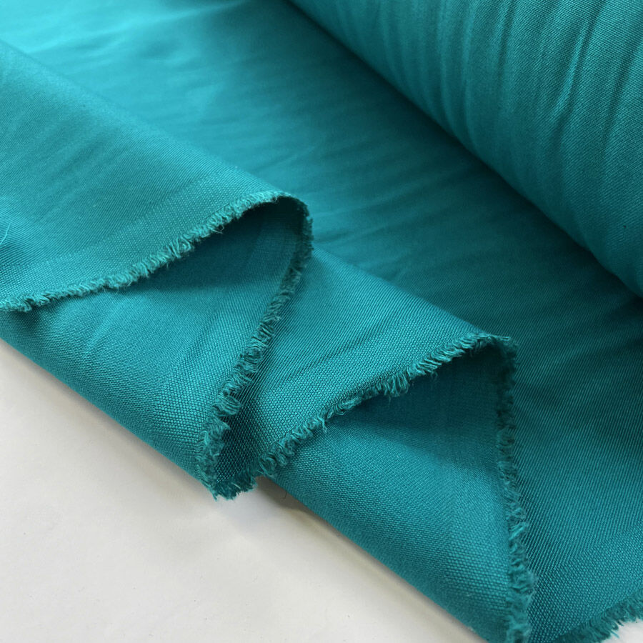 Kalite Sea Green Polyester Cotton Lightweight Trousering Fabric Fold