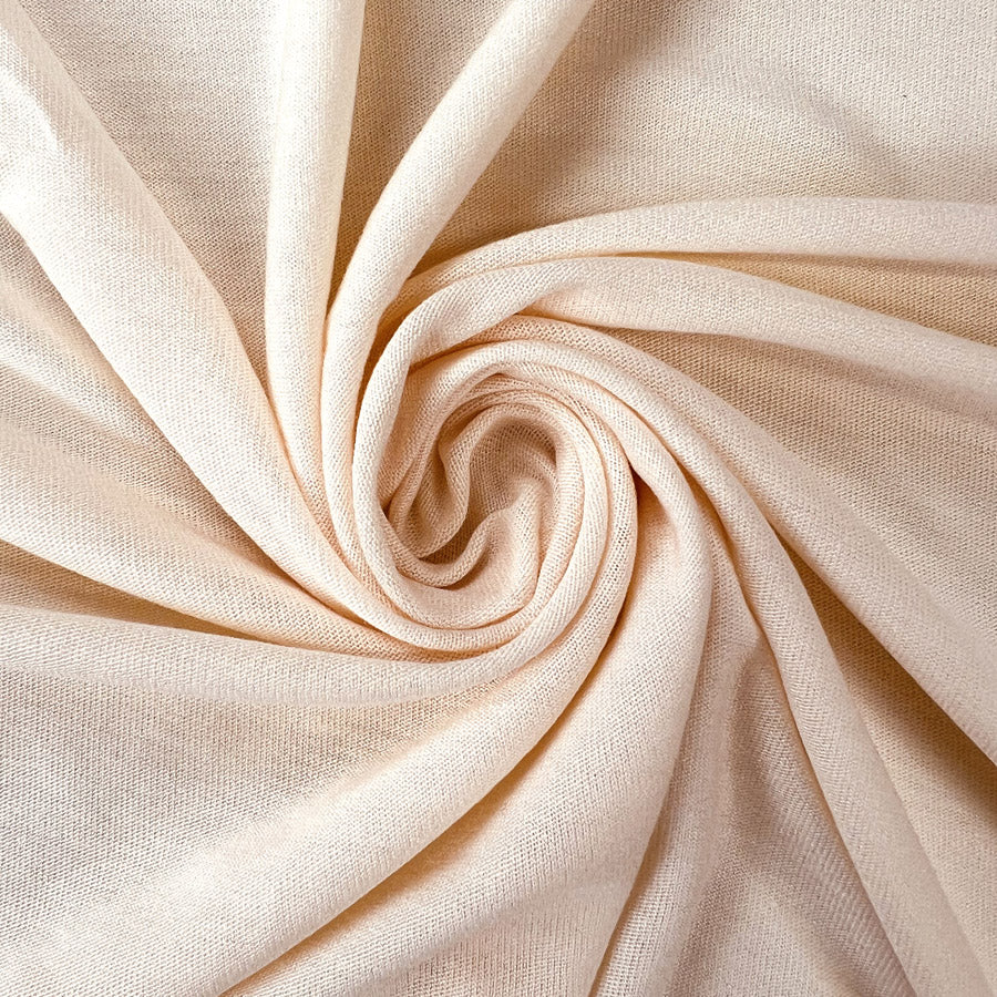 Lightweight Viscose Jersey Dress Fabric Pastel Peach Twist