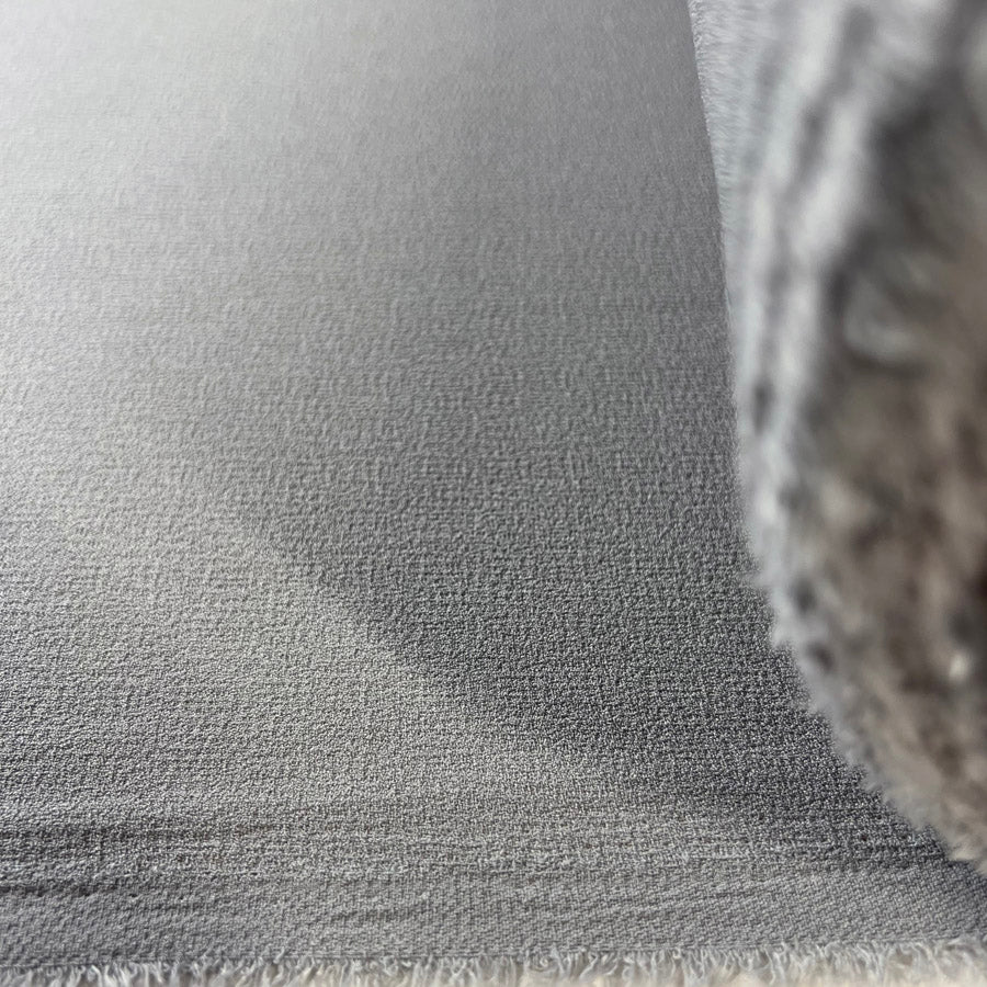 Lorien Crepe Grey Polyester Dressmaking Fabric Roll