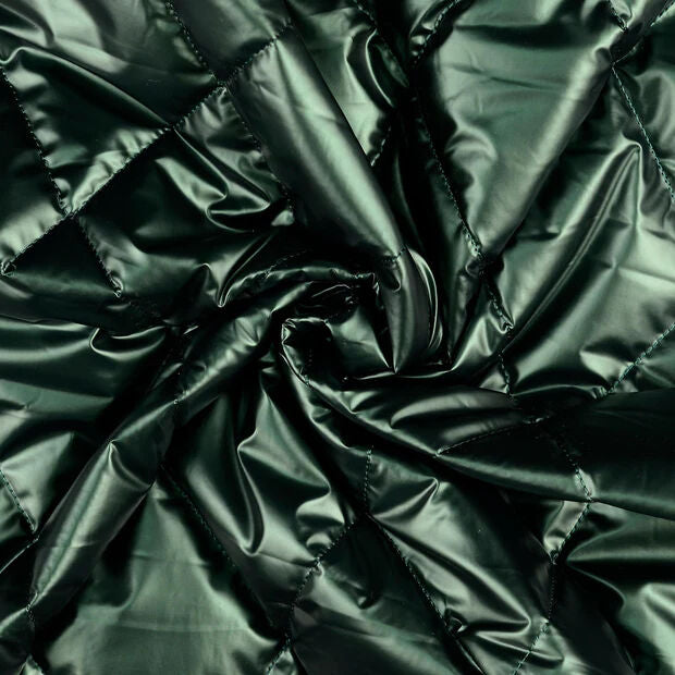 Metallic Marvel Green Shiny Polyester Quilted Black Coating Fabric Twist