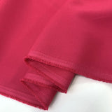 Not The Only Fruit Cerise Polyester Elastane Trousering Fabric Fold