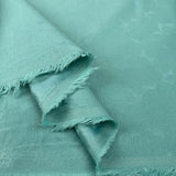 Opaline brocade mint cotton polyester spandex floral jacquard woven dress fabric fold