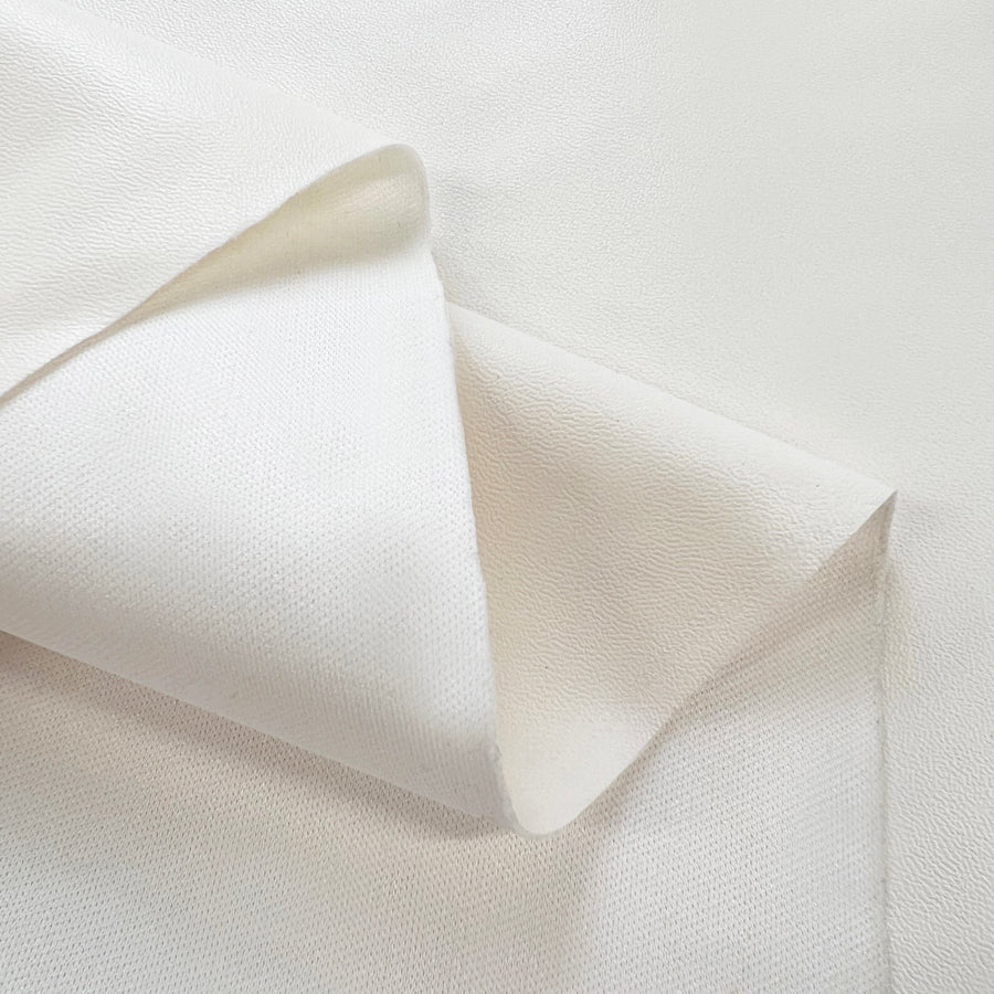 Pearl Pizzazz Ivory Pleather Satin Polyester Fabric Fold