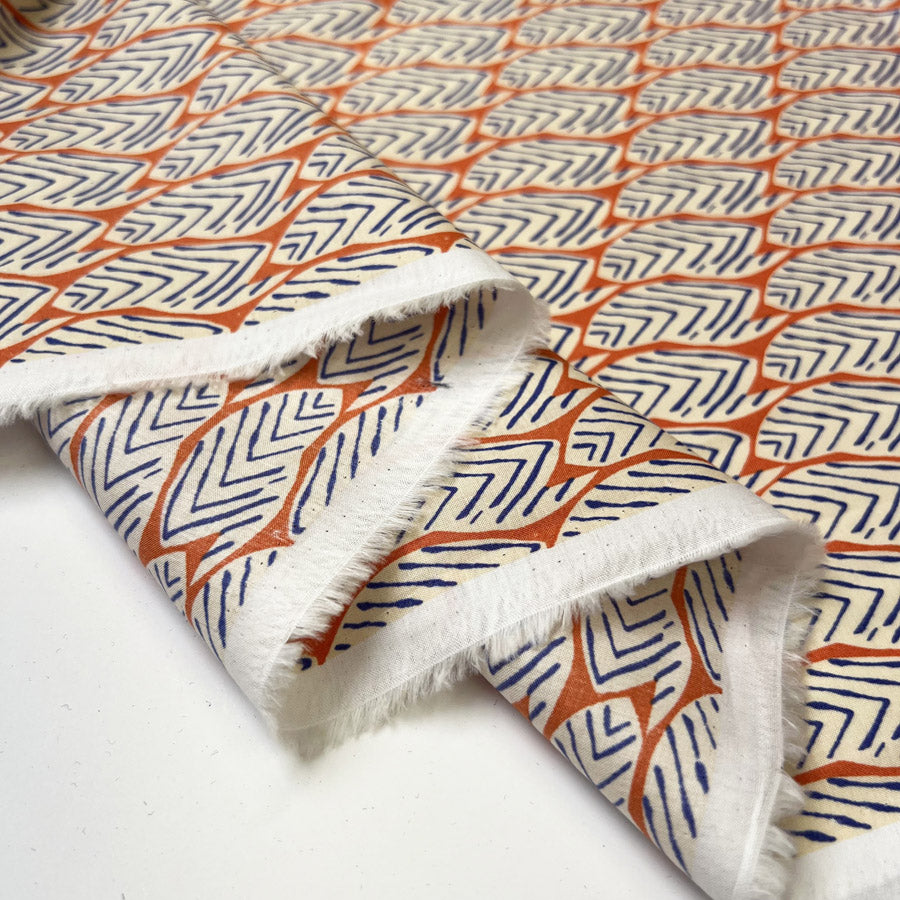 Pima Cotton Lawn Tribal Grove Orange Leaf Print Blue Woven Dress Fabric Fold
